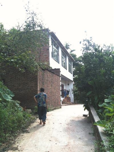 宜宾市李端镇新田村，张贵英老家。去年底去宜宾之前，她曾在家里待了几个月。[新京报记者 刘刚 摄]