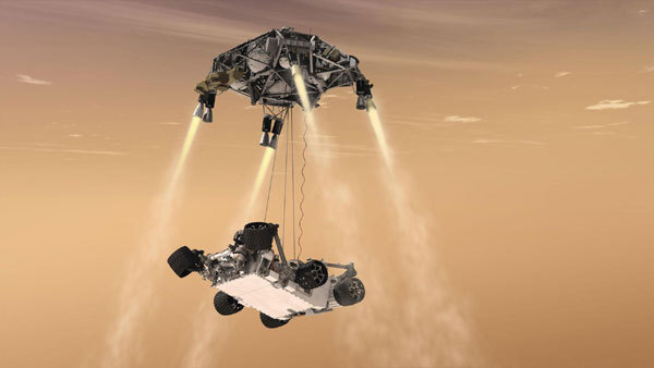 This artist's concept shows the sky crane maneuver during the descent of NASA's Curiosity rover to the Martian surface. [Agencies]