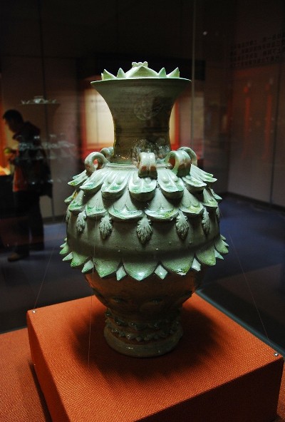 Green glazed vase covered with lotus design, one of the 'Top 10 masterpieces inside the National Museum of China' by China.org.cn.