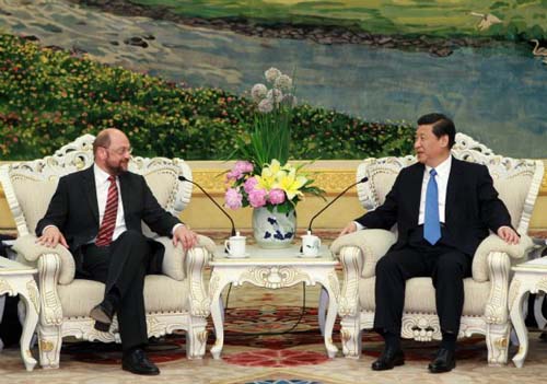 Chinese Vice President Xi Jinping (R) talks to Martin Schulz, chair of the Group of the Progressive Alliance of Socialists and Democrats in the European Parliament, in Beijing, capital of China, May 16, 2011. Xi met with leaders of European political parties attending the second China-Europe High-level Political Parties Forum. [Xinhua Photo] 