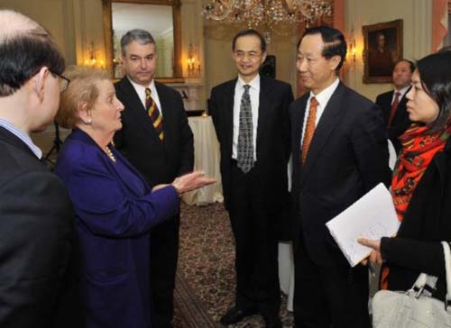 Wang Jiarui (2nd R), visiting head of the International Department of the Communist Party of China (CPC) Central Committee, talks with Madeleine Albright (2nd L), representative of U.S. Democratic Party and former U.S. secretary of state, during the 2nd U.S.-China High-Level Political Party Leaders Dialogue in Washington, the United States, Dec. 3, 2010. [Xinhua Photo] 