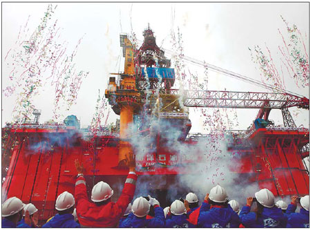 The launching ceremony in 2011 in Shanghai for China National Offshore Oil Corp's drilling platform 981. The company said on Tuesday it has opened 26 new offshore blocks for cooperation with foreign companies. [Photo/China Daily]