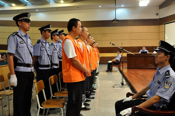 People accused of being involved in a gutter oil selling case stand trial on Tuesday in Ningbo, Zhejiang province. Provided by Ningbo Intermediate People's Court.