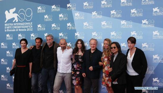 Jury members of 'VENEZIA 69' (main competition section) pose for photos during a photocall at he 69th Venice Film Festival, in Venice, Italy, Aug. 29, 2012. The festival will last from Aug. 29 to Sep. 8, 2012. [Xinhua]