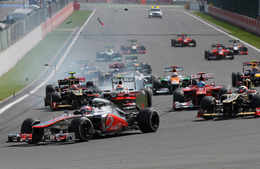 Lewis Hamilton of Mclaren and Fernando Alonso of Ferrari involved in the first corner crash during the start of the 2012 Belgium Formula One Grand Prix at the Spa-Francorchamps race track near Francorchamps, Belgium, Sept.2, 2012.