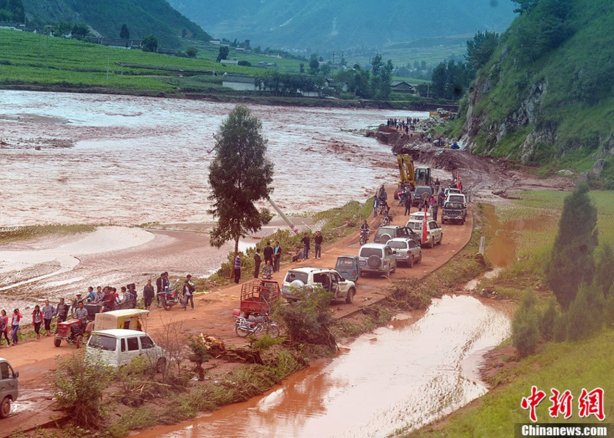 The floods gradually subside in Xide County, Sichuan Province, on Sept. 2, 2012. The floods have inundated more than 7,000 houses and caused power cut in the area. More than 100,000 have been affected by the floods, with one dead and two missing. 