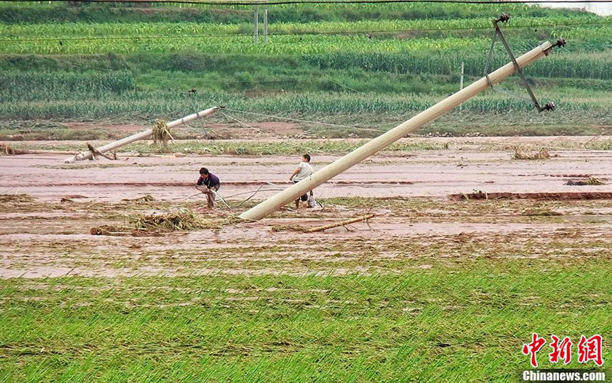 The floods gradually subside in Xide County, Sichuan Province, on Sept. 2, 2012. The floods have inundated more than 7,000 houses and caused power cut in the area. More than 100,000 have been affected by the floods, with one dead and two missing. 