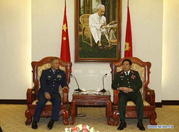 Deputy Chief of the General Staff of the Chinese People's Liberation Army Ma Xiaotian (L) meets with Vietnamese Defence Minister Phung Quang Thanh in Hanoi, Vietnam, Sept. 3, 2012. [Ho Nhu Y/Xinhua]