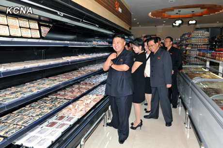 North Korea's top leader Kim Jong Un and his wife Ri Sol Ju visits Haemaji Restaurant before its opening to business, according to the country's official news agency KCNA's report on August 30. [Xinhua/KCNA]