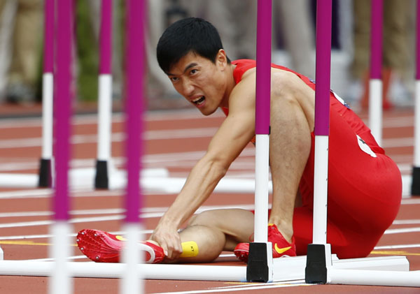 China's star hurdler Liu Xiang clattered into the first hurdle due to his Achilles tendon injury in the London preliminary heat.