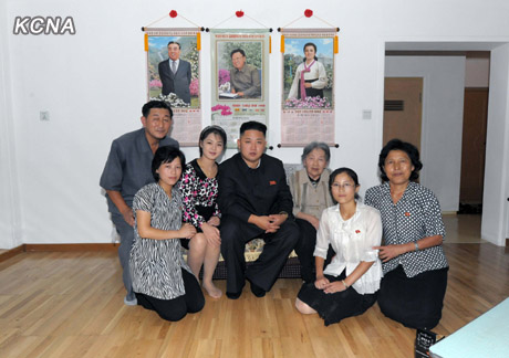 North Korea's top leader Kim Jong Un and his wife Ri Sol Ju visit working people's new flats in Changjon Street, according to the country's official news agency KCNA's report on Sept. 5, 2012.[Xinhua/KCNA]