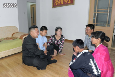 North Korea's top leader Kim Jong Un and his wife Ri Sol Ju visit working people's new flats in Changjon Street, according to the country's official news agency KCNA's report on Sept. 5, 2012.[Xinhua/KCNA]