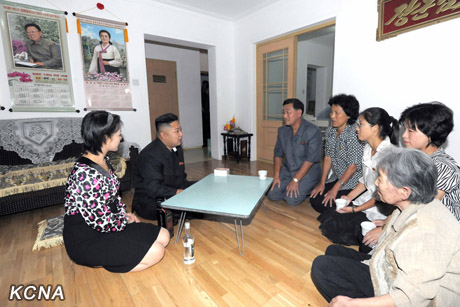 North Korea's top leader Kim Jong Un and his wife Ri Sol Ju visit working people's new flats in Changjon Street, according to the country's official news agency KCNA's report on Sept. 5, 2012.[Xinhua/KCNA]