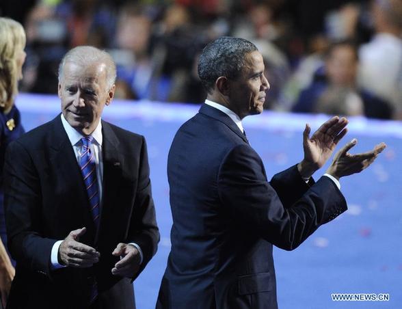 U.S. President Barack Obama (R) and Vice President Joe Biden celebrate at the Democratic National Convention in Charlotte Sept. 6, 2012. U.S. President Barack Obama on Thursday night formally accepted the Democratic Party's presidential nomination, offering his own 'harder but better path' to rejuvenate support just two months ahead of the November election. [Zhang Jun/Xinhua]