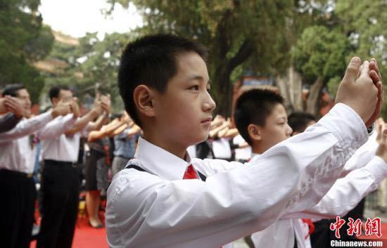 At Beijing's Guo Zi Jian, or the Imperial College, the ancient ceremony of students saluting teachers is reenacted. 