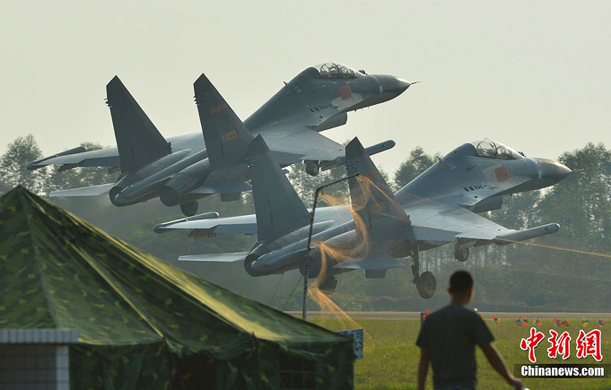 An aviation division of the air force under the Guangzhou Military Area Command (MAC) of the Chinese People&apos;s Liberation Army (PLA) has conducted live-fire attack training on the sea recently. It improves the pilots&apos; offshore low altitude offense and defense capability.