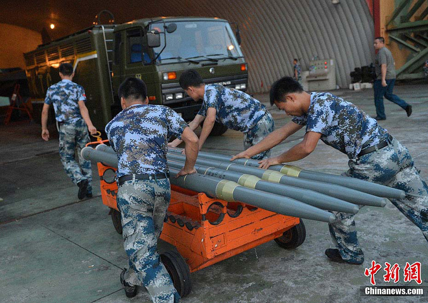 An aviation division of the air force under the Guangzhou Military Area Command (MAC) of the Chinese People&apos;s Liberation Army (PLA) has conducted live-fire attack training on the sea recently. It improves the pilots&apos; offshore low altitude offense and defense capability.