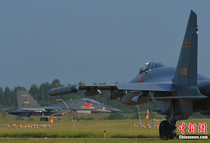 An aviation division of the air force under the Guangzhou Military Area Command (MAC) of the Chinese People&apos;s Liberation Army (PLA) has conducted live-fire attack training on the sea recently. It improves the pilots&apos; offshore low altitude offense and defense capability.