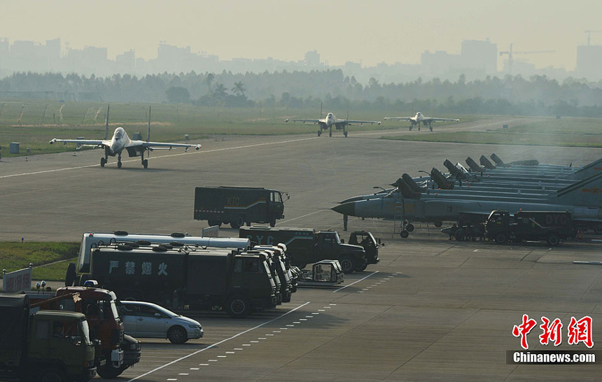 An aviation division of the air force under the Guangzhou Military Area Command (MAC) of the Chinese People&apos;s Liberation Army (PLA) has conducted live-fire attack training on the sea recently. It improves the pilots&apos; offshore low altitude offense and defense capability.