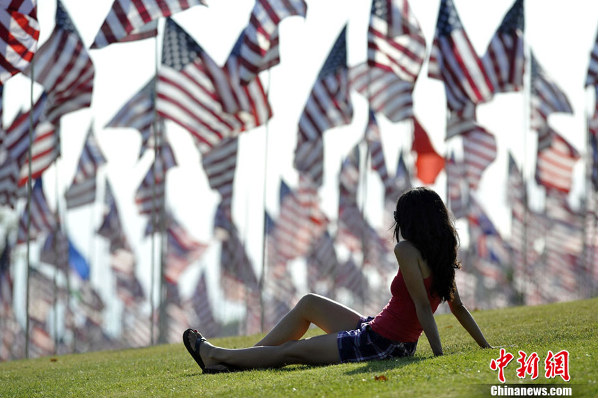 3,000 US national flags are erected by students and staff from Pepperdine University to honor victims of the 9/11 attacks, in Malibu on September 9, 2012. 