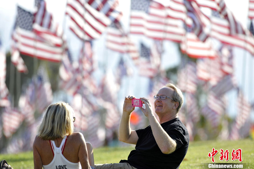 3,000 US national flags are erected by students and staff from Pepperdine University to honor victims of the 9/11 attacks, in Malibu on September 9, 2012. 