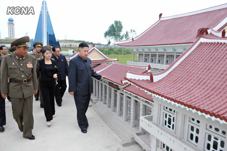 North Korea's top leader Kim Jong Un and his wife Ri Sol Ju inspect the Pyongyang Folk Park nearing its completion, according to the country's official news agency KCNA's report on Sept. 10. [KCNA] 