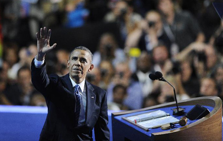 U.S. President Barack Obama waves to his supporters during the Democratic National Convention in Charlotte Sept. 6, 2012. [Zhang Jun/Xinhua]