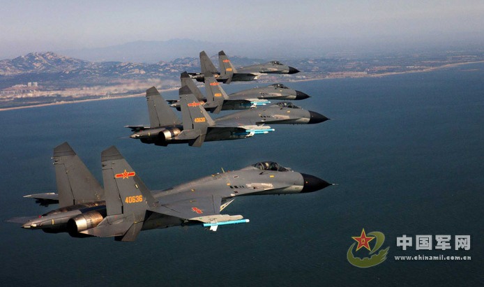 Crews at an air unit of the Jinan Military Region pilot new-type fighters J-11B in a live ammunition drill to enhance operation capabilities, as part of China's recent efforts to step up its military exercises.[Photo/chinamil.com.cn]