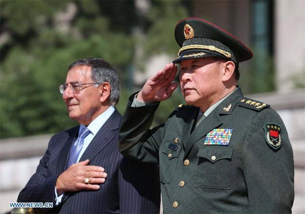 Chinese Defense Minister Liang Guanglie (R) hosts a welcoming ceremony for U.S. Secretary of Defense Leon Panetta in Beijing, capital of China, Sept. 18, 2012. Liang Guanglie held talks with Leon Panetta in Beijing on Tuesday. [Xinhua]