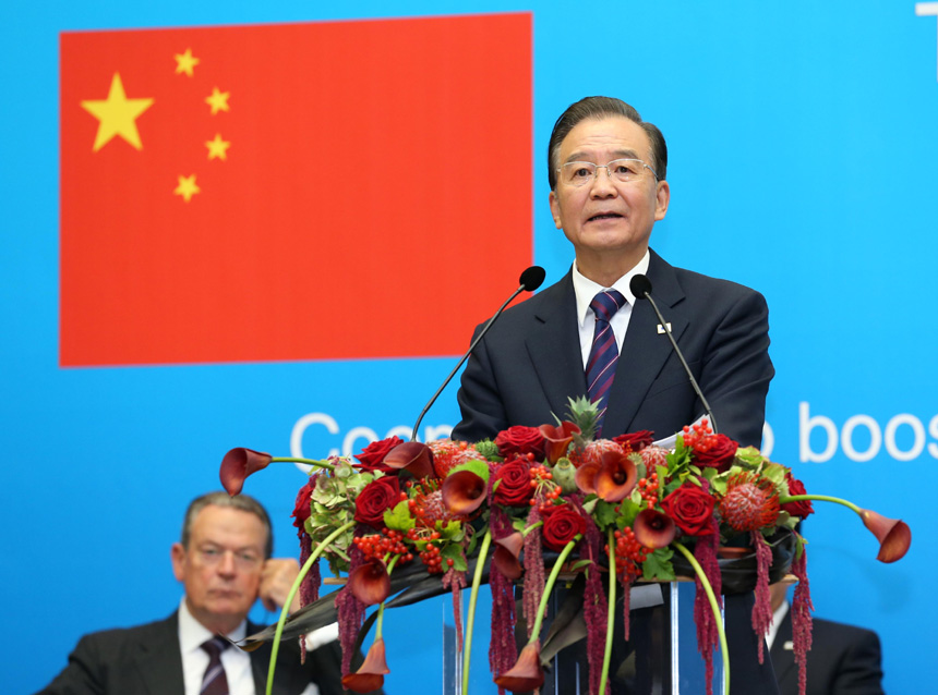 Chinese Premier Wen Jiabao addresses the 8th EU-China Business Summit in Brussels, Belgium, Sept. 20, 2012. [Xinhua photo]
