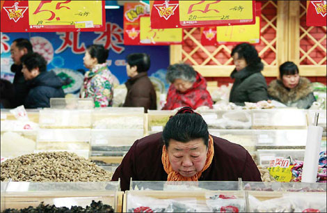 China's economy is expected to grow by 7.7 percent during the first three quarters of the year, while for the whole year, the growth rate will be 7.8 percent. [Photo/China Daily]