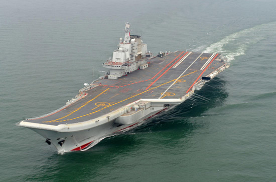 The carrier, Liaoning, was delivered and commissioned to the People's Liberation Army navy following its successful completion of sea trials.[Photo/ Xinhua]