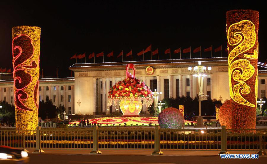 Flower decorations are seen at the Tian&apos;anmen Square in Beijing on the evening of Sept. 28. Flowers are laid on the city&apos;s streets and squares to greet the upcoming National Day on Oct. 1. 