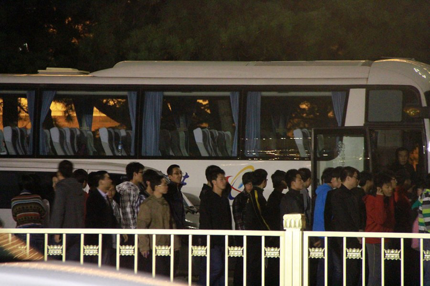 In this photo taken on Sept. 28, 2012, university students attend a rehearsal on the Tiananmen Square in Beijing for the celebration of the National Day.