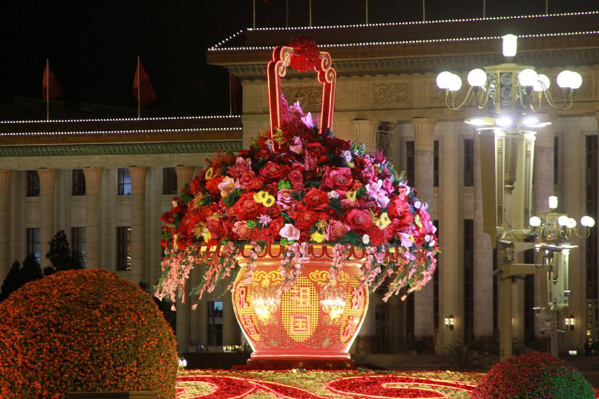 Flower decorations are seen at the Tian&apos;anmen Square in Beijing on the evening of Sept. 28. Flowers are laid on the city&apos;s streets and squares to greet the upcoming National Day on Oct. 1.