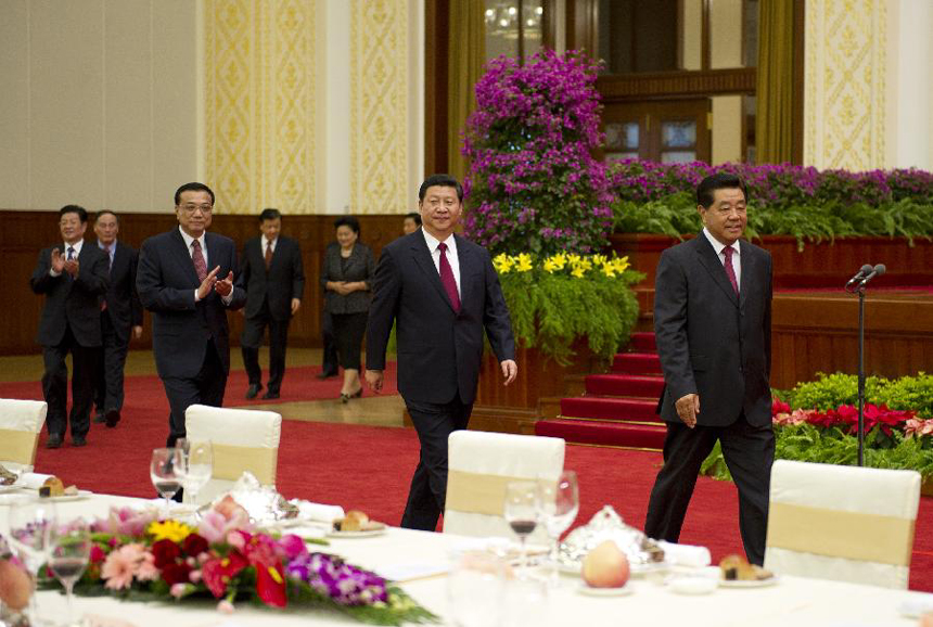 Jia Qinglin (R, front), chairman of the National Committee of the Chinese People&apos;s Political Consultative Conference (CPPCC), Chinese Vice President Xi Jinping (C front) and Vice Premier Li Keqiang (L, front) attend a reception marking the 63rd anniversary of the founding of the People&apos;s Republic of China in Beijing, capital of China, Sept. 28, 2012. 