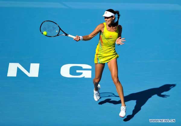 Ana Ivanovic of Serbia hits a shot to Romina Oprandi of Switzerland during the women's singles 2nd round match at the China Open tennis tournament in Beijing, China, Oct. 3, 2012. Ivanovic lost 0-2. [Xinhua]