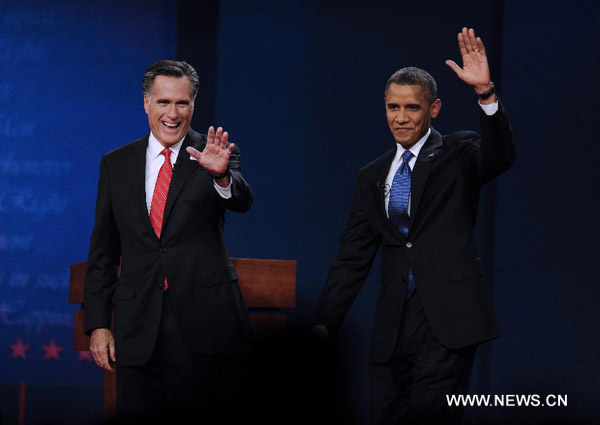 U.S. President Barrack Obama (R) and Republican presidential candidateMitt Romneyattend the first presidential debate at Denver University, Denver, Colorado, theUnited States, Oct. 3, 2012. [Xinhua]
