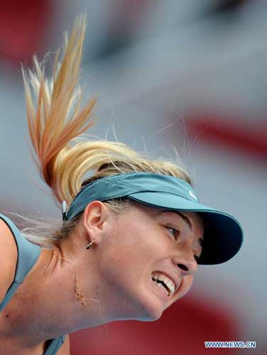 Maria Sharapova of Russia competes during the women's singles 3rd round match against Polona Hercog of Slovenia at the China Open tennis tournament in Beijing, China, on Oct. 4, 2012. Sharapova won 2-0. [Xinhua]