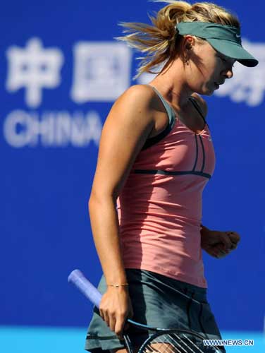 Maria Sharapova of Russia reacts during the women's singles 3rd round match against Polona Hercog of Slovenia at the China Open tennis tournament in Beijing, China, on Oct. 4, 2012. Sharapova won 2-0. [Xinhua]