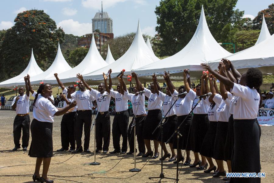 Teachers sing a song at a ceremony to mark the 2012 World Teachers' Day in Nairobi, Kenya, Oct. 5, 2012. Since the World Teachers Day was created by the United Nations Educational, Scientific and Cultural Organization (UNESCO) in 1994, it has been celebrated with an aim to mobilize support for teachers and to ensure that the needs of future generations will continue to be met by teachers. 