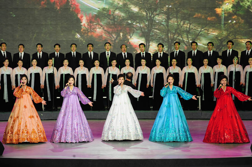 Artists from the Democratic People&apos;s Republic of Korea (DPRK) give performance at the opening ceremony of the 2012 China-DPRK Economic, Trade, Cultural and Tourism Expo in Dandong, northeast China&apos;s Liaoning Province, Oct. 12, 2012. The five-day event which kicked off here on Friday has attracted over 400 exhibitors. A DPRK delegation of about 500 members will attend the expo.