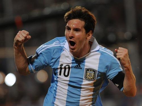 Lionel Messi scored two second-half goals as Argentina beat Uruguay 3-0 on Friday to return to the top of the South American zone World Cup 2014 qualifying.