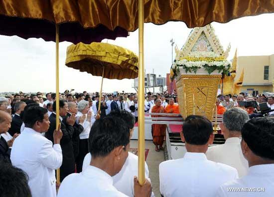 The coffin of late Cambodian King-Father Norodom Sihanouk arrives at the airport of Phnom Penh, Cambodia, Oct. 17, 2012.