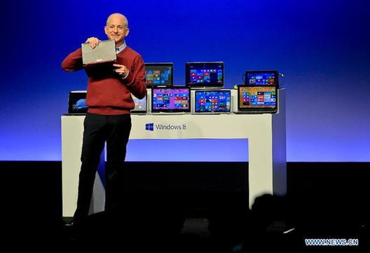 Seven Sinofsky, president of Microsoft's Windows division, introduces the company's new tablet computer 'Surface' at a media preview in Shanghai, east China, Oct. 23, 2012. 