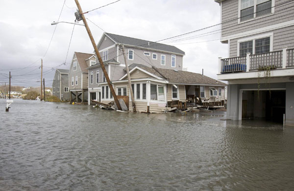 Flooding and destroyed homes are pictured in the Silver Sands neighborhood of East Haven, Connecticut after Hurricane Sandy hit the area October 30, 2012. [Agencies] 