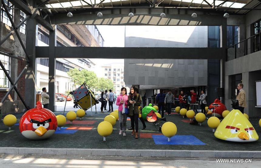 Visitors are seen at an Angry Birds outdoor theme park in Shanghai, east China, Oct. 31, 2012. The theme park, which is located in Tongji University, covers an area of about 200 square meters.