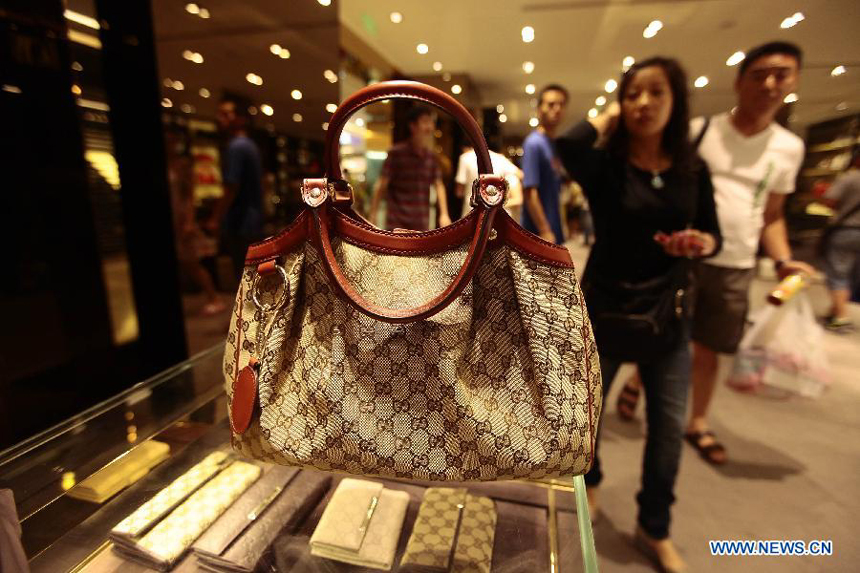 A hand bag is displayed at a duty free shop in Sanya, south China&apos;s island province of Hainan, on Oct. 31, 2012. 