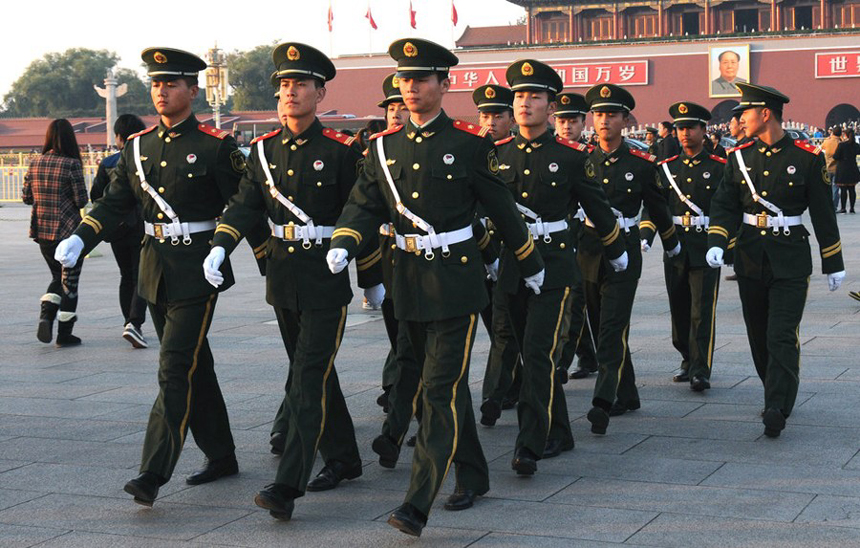Armed police patrol Tian&apos;anmen Square on Nov. 1, as security tightens in anticipation of the 18th CPC National Congress. [Photo from www.gmw.cn] 