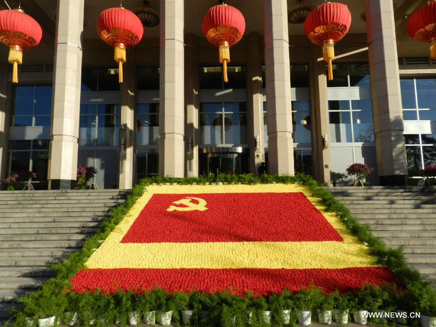 Flower decorations are seen to greet the upcoming 18th National Congress of the Communist Party of China (CPC) in Beijing, capital of China, Oct. 30, 2012. The CPC&apos;s 18th National Congress will be convened on Nov. 8, with more than 2,000 CPC delegates gathering for the meeting, which occurs every five years. A new CPC leadership will be elected during the meeting, setting a new direction for the country&apos;s development in the near future. 